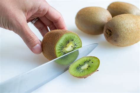 How to Cut Kiwi for Fruit Salad: A Journey Through Culinary Creativity and Beyond